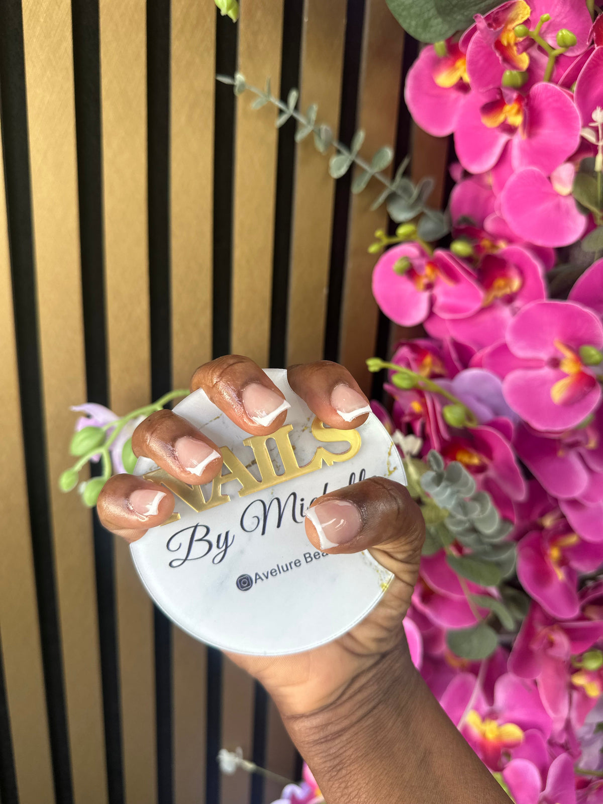 French tip nails with Avelure Beauty branding